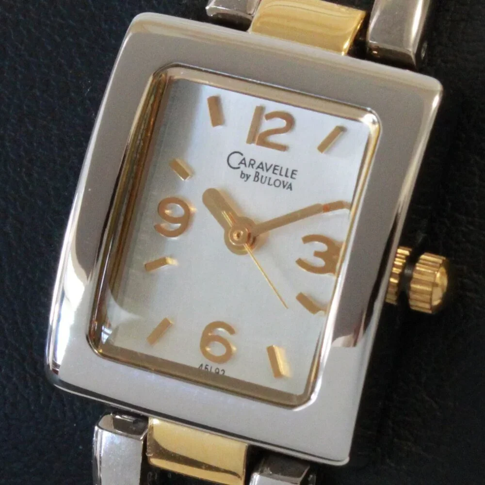 Caravelle Ladies Silver Tone With Gold Accents ½ Bangle Bracelet MOP Dial 16mm